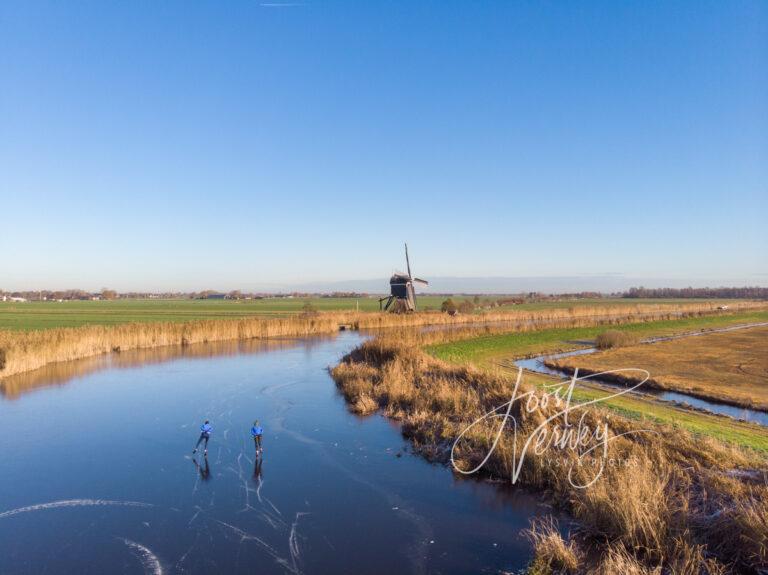 Luchtfoto winters polderlandschap D2212161728