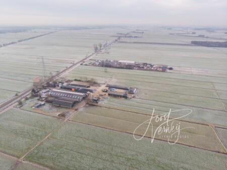 Luchtfoto winters polderlandschap