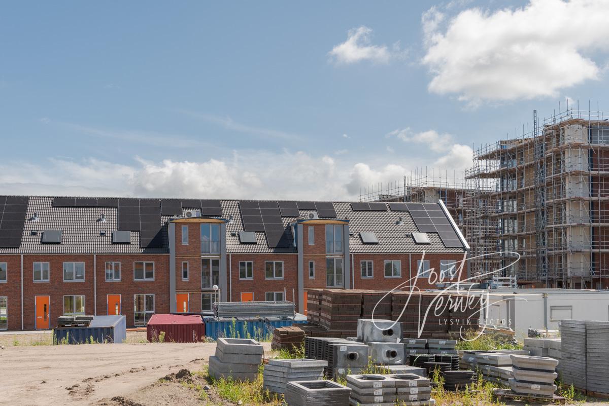 Nieuwbouw woonhuizen en appartementen project De Rokerij